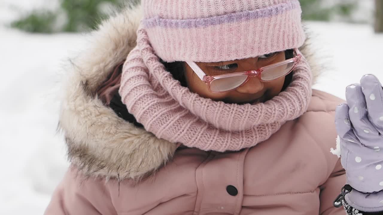 Child in Pink Winter Outfit