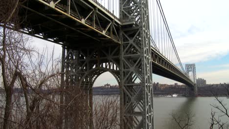 tilt up reveals the george washington bridge connecting new york to new jersey