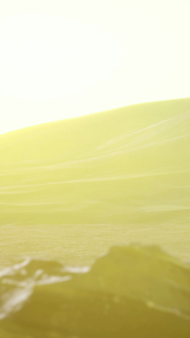 Golden sunlight spills over serene hills at dusk creating magical landscape
