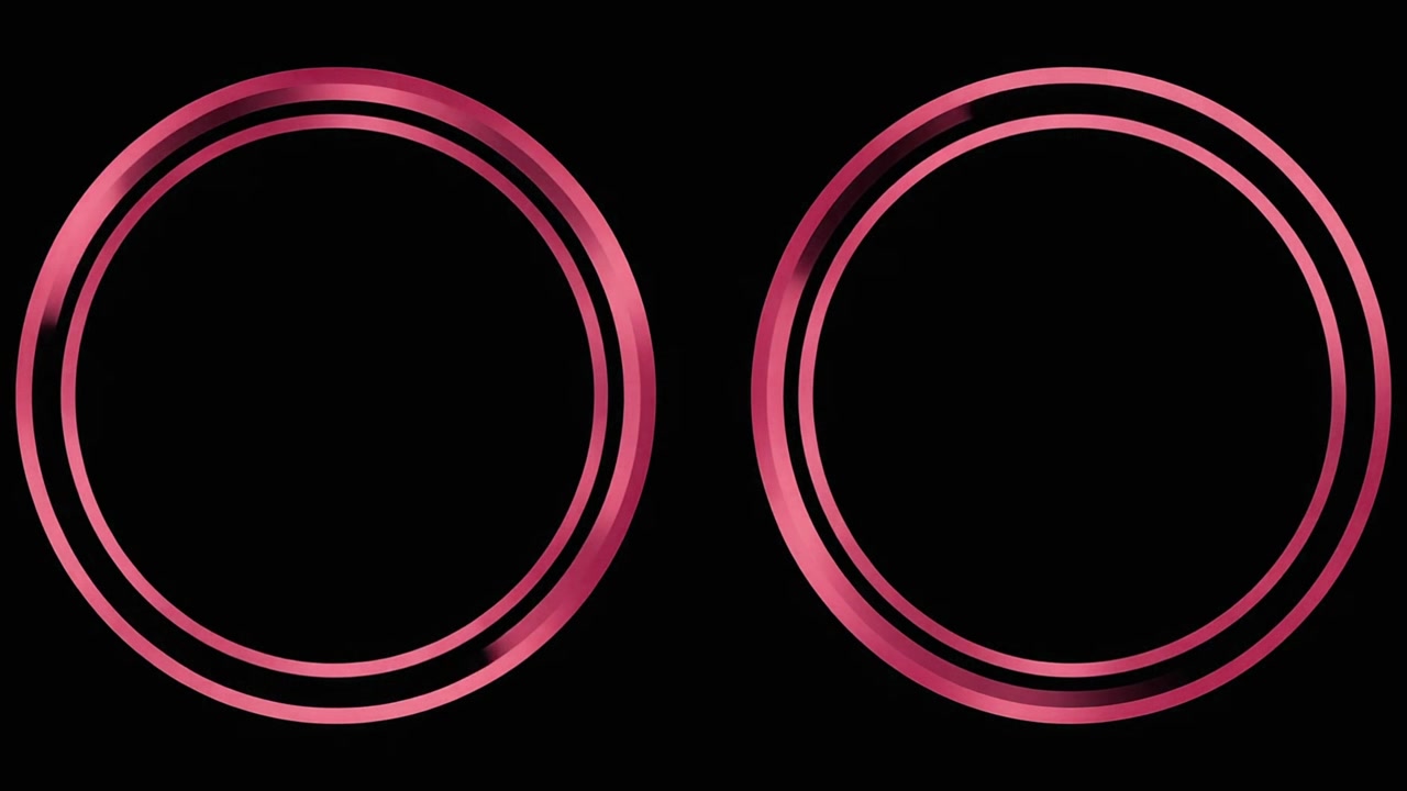 Two Glowing Pink Circular Frames on Black Background