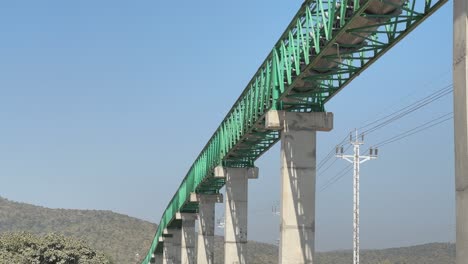 a metal structured bridge to support pipe line or industrial belt system to transport the raw material