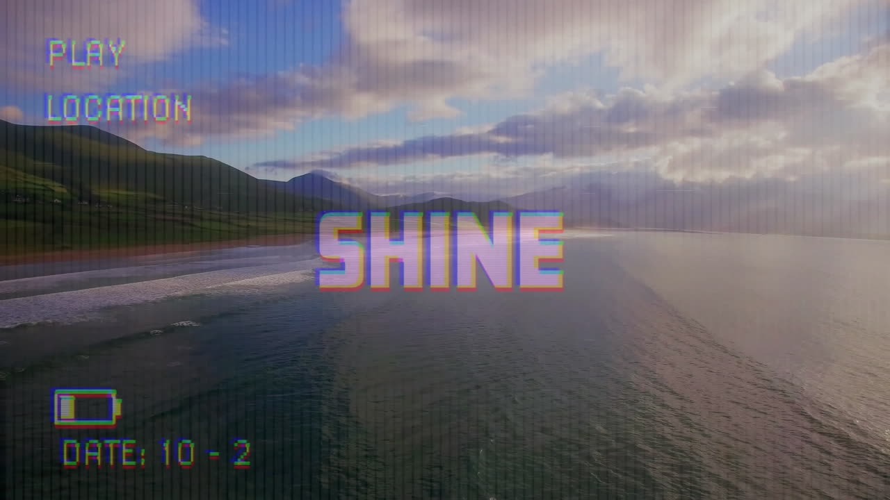 Animation of shine text on video camera screen with digital interface filming sea landscape