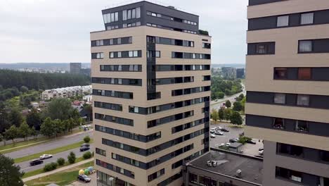 Fly-away-form-high-tall-rise-building-opening-city-scape