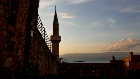 cesme castle, locally known as cesme kalesi, lies at the harbour of the cesme town in the province of izmir in turkey.