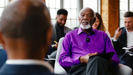 senior black man speaking at conference