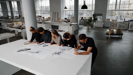 designers sketching in a modern studio