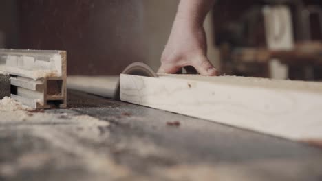 cutting boards on a circular saw in a joinery