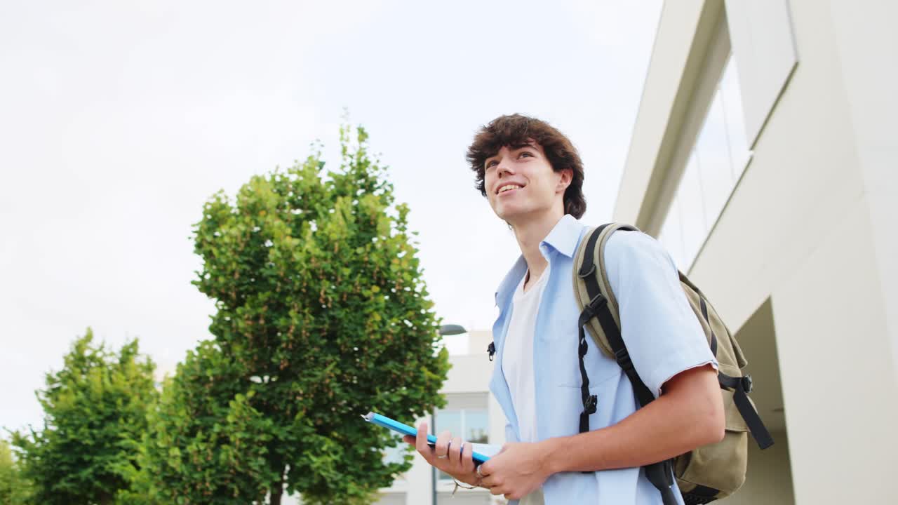 Student on campus with backpack