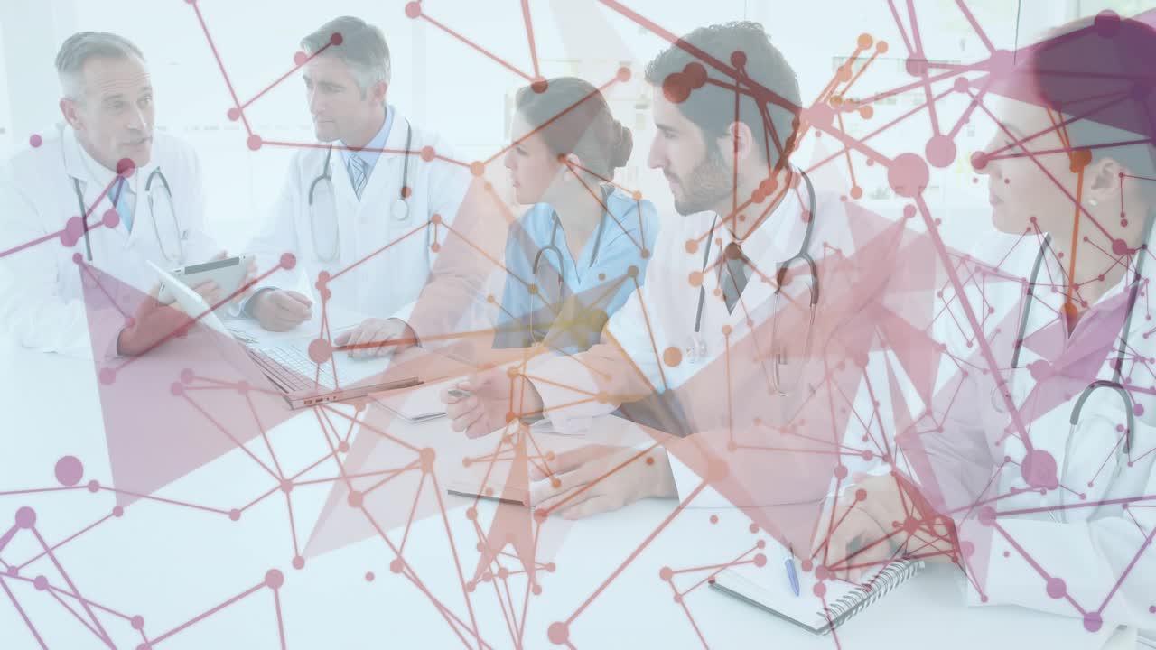 Senior physician tapping tablet and explaining medical data, overlay growing as team reviewing data