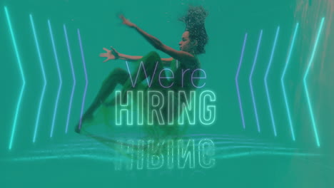 underwater, person surrounded by glowing arrows and we're hiring animation text