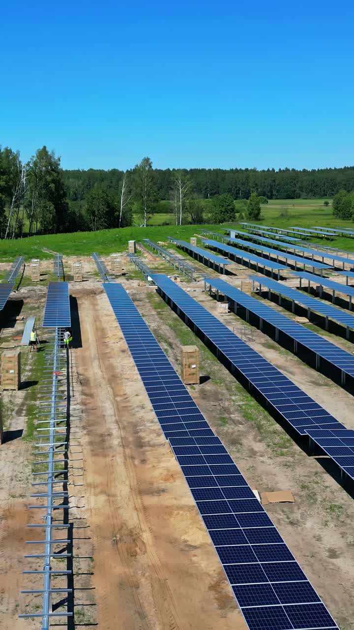 Solar panel lines under construction, aerial vertical view