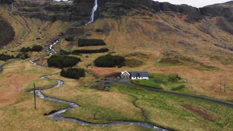 aerial recording of the waterfall bjarnarfoss in iceland