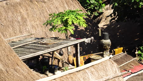 houses with traditional grass roof in the village in lombok, indonesia