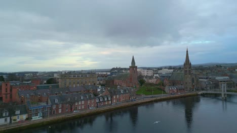 aerial 4k drone footage approaching old high church by the river in inverness, scotland