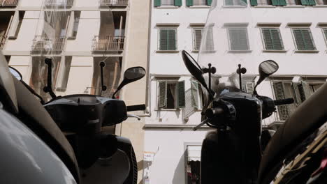 motor scooters parked in a florence street