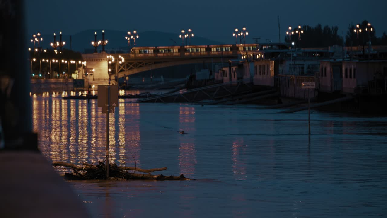 Night Flood in City with Boats and Bridge