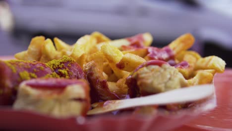 Tasty-curry-sausage-with-golden-french-fries-and-Ketchup-in-Berlin