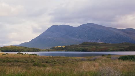 scenic view of a mountain range overlooking the lochs in the scottish highlands