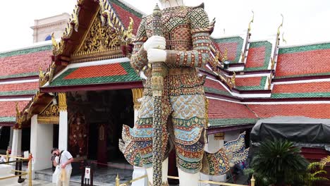 tourists admire the ornate temple architecture