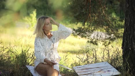 an artist joyfully celebrates creativity and finds peace in nature and artistic pursuits
