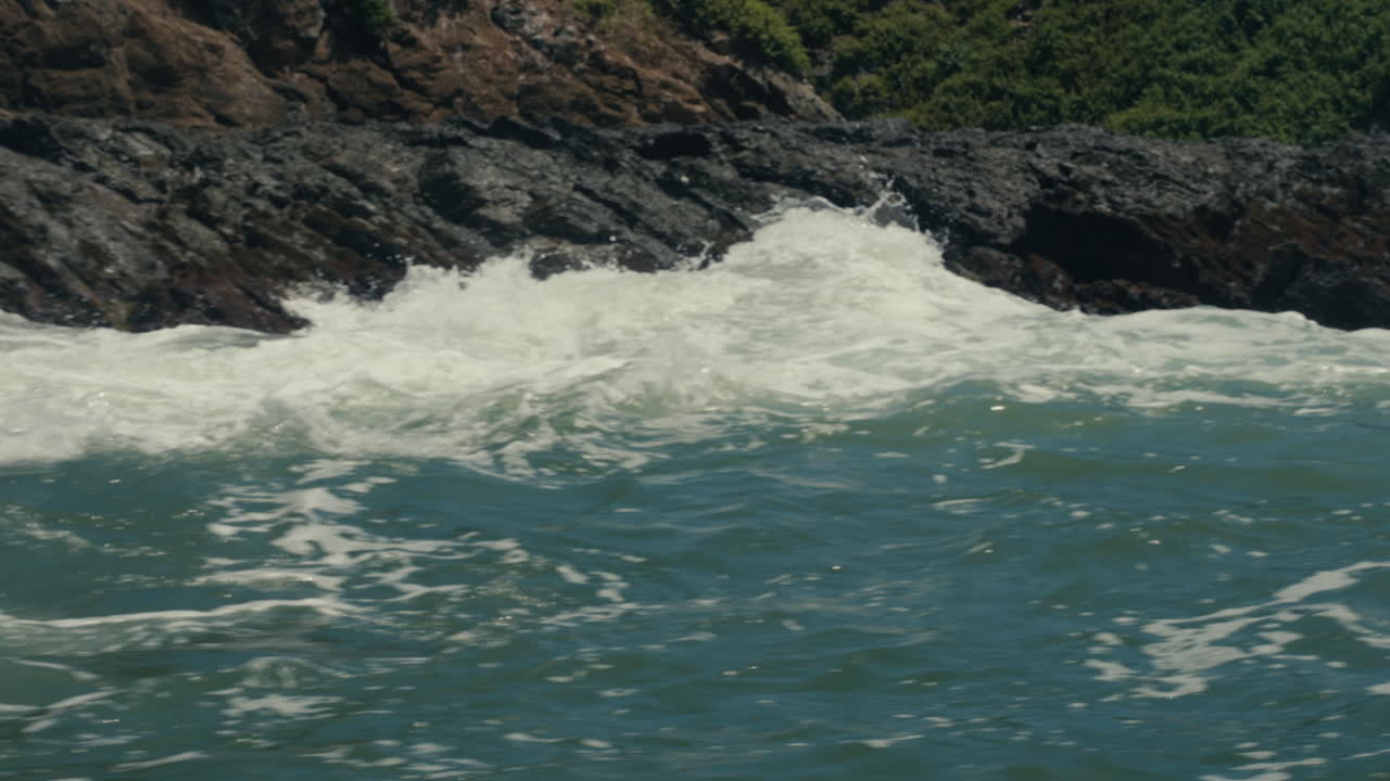 Waves crashing on a rocky coastline