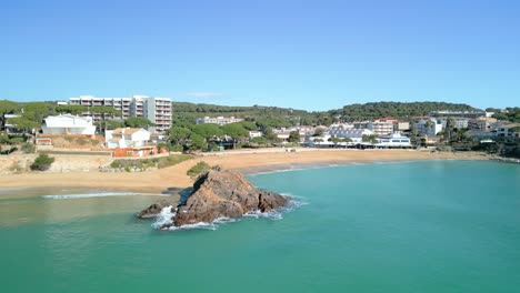 Aerial-photographs-of-La-Fosca-highlight-the-tranquil-ambiance-of-its-secluded-coves,-ideal-for-intimate-moments-and-private-escapes