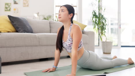 Yoga,-cobra-and-woman-with-tablet-in-online-class