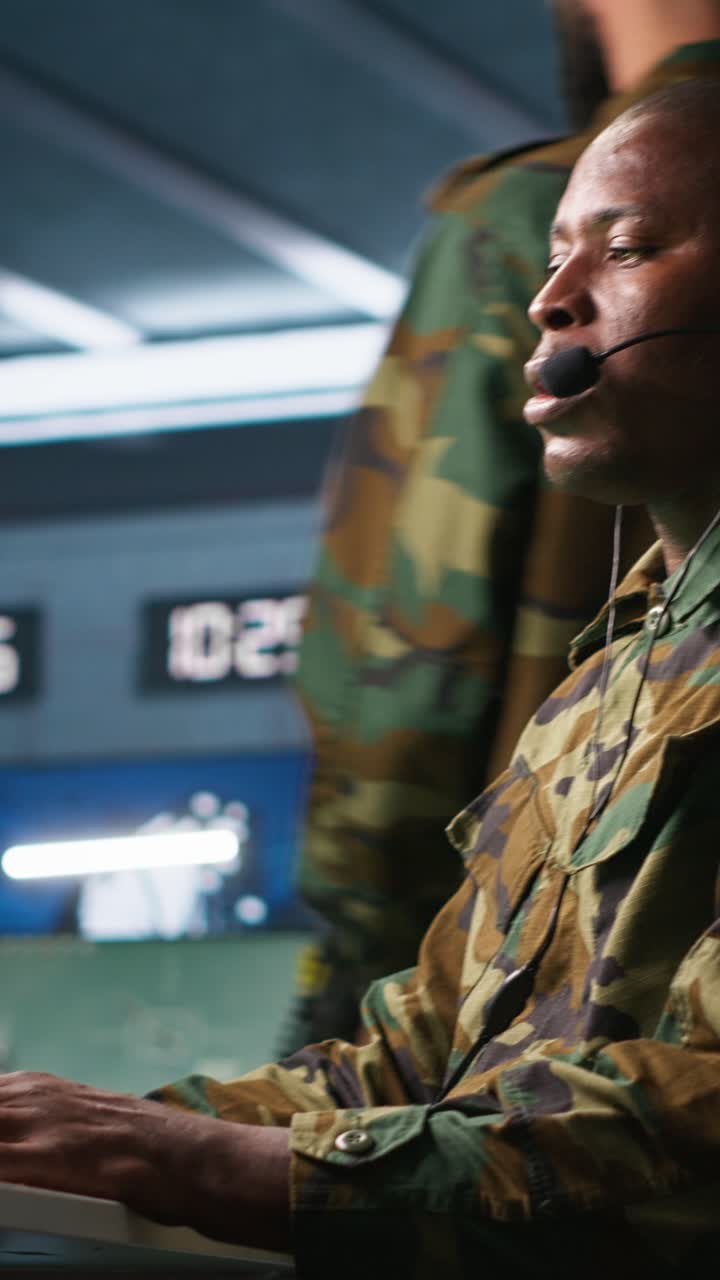Vertical video Dispatcher keeping in touch with allied troops engaging enemy forces