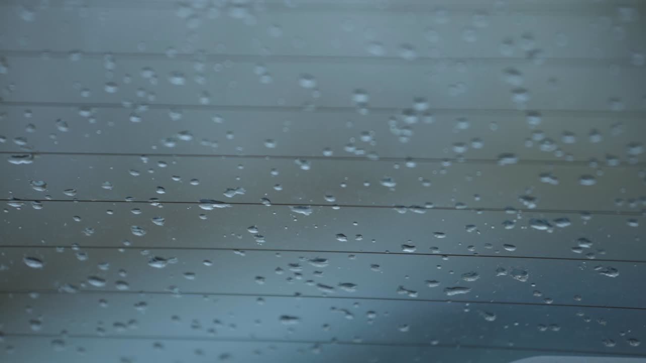 Raindrops Left On the Car Windshield - Closeup Shot