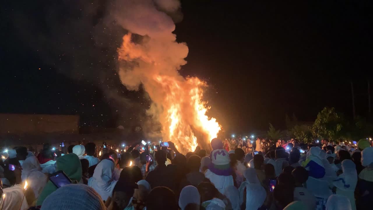 Night shot, Big flame fire, Celebrating Meskel day with Ethiopian Christian Orthodox around it