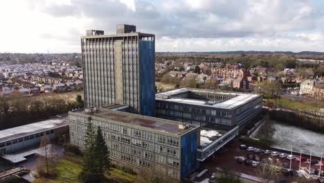 aerial view pilkington's glass head office, blue high-rise with shared office space and gardens