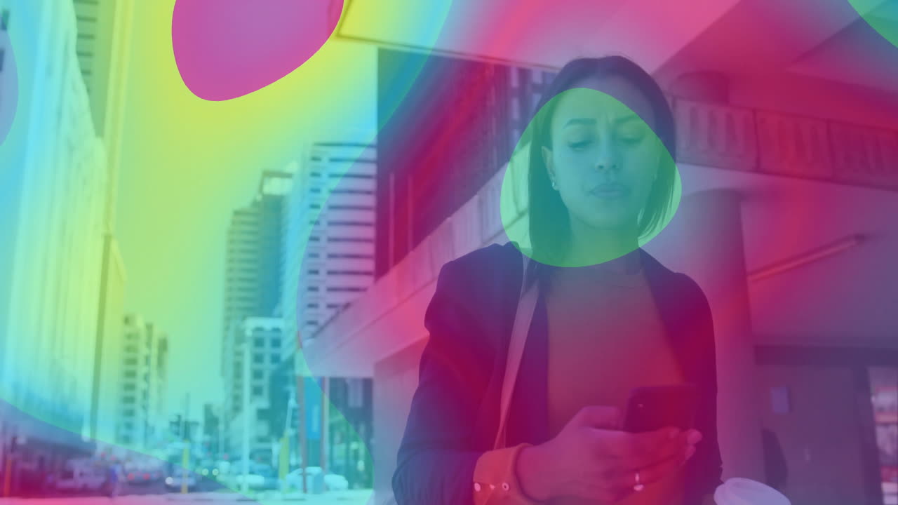 Using smartphone, woman with colorful abstract animation on cityscape background