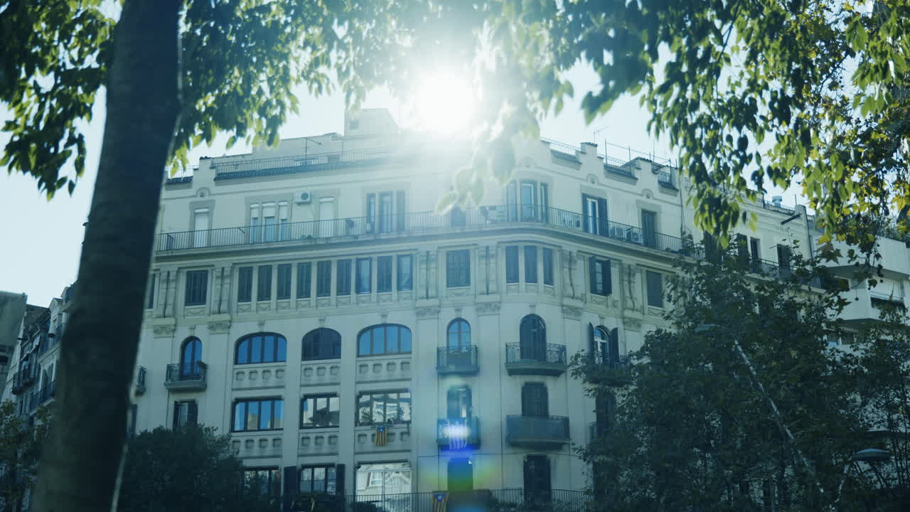 European Building with Trees and Sunlight