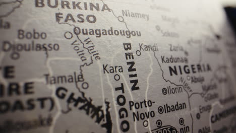 close-up of a globe displaying west african countries