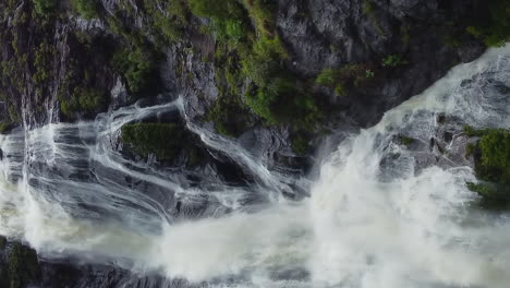 Aerial-view-approaching-huge-Colnett-waterfall-near-Hienghene,-New-Caledonia