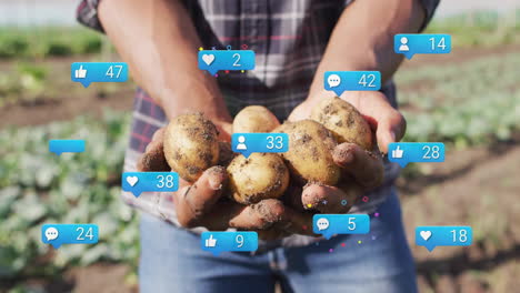 Male farmer holding potatoes in field, showcasing digital marketing with animated social reactions