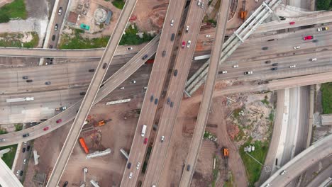 Birds-eye-view-of-traffic-on-610-and-59-South-freeway-in-Houston,-Texas