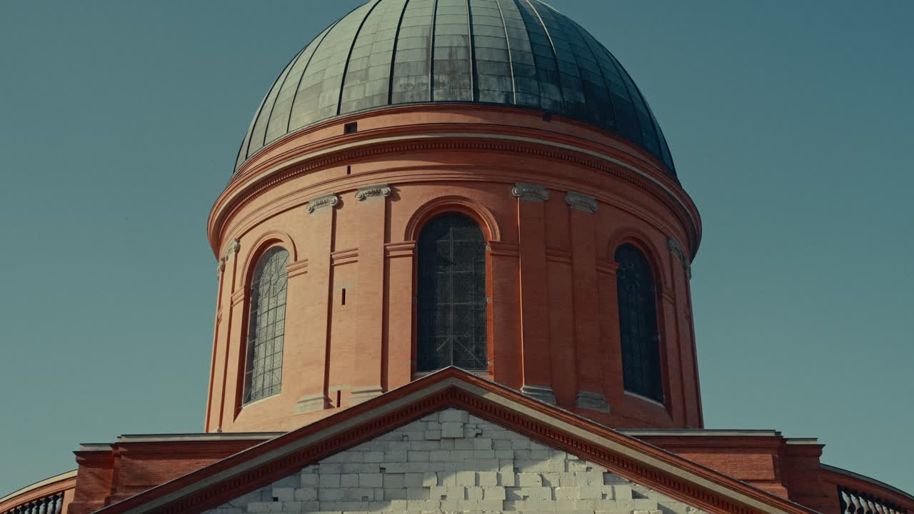 Close-up of a Classical Dome on a Historic Brick Building