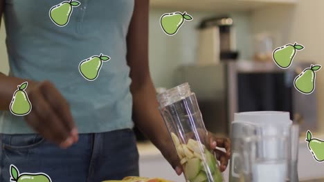 animation of african american woman making healthy drink over pears