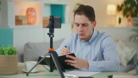 man attends online training