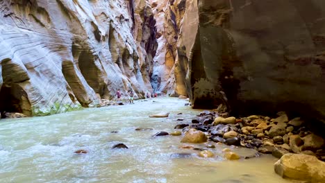 Hiking-Down-the-Narrows,-Zion-National-Park,-Family-Adventure