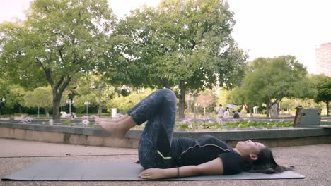 Asian-woman-exercise-in-park-outdoor-with-new-normal-in-COVID-19-situation