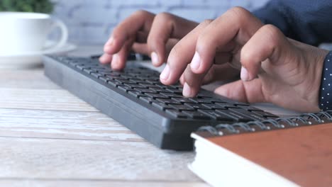 person typing on a keyboard