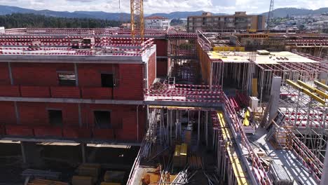 building construction with cranes aerial view