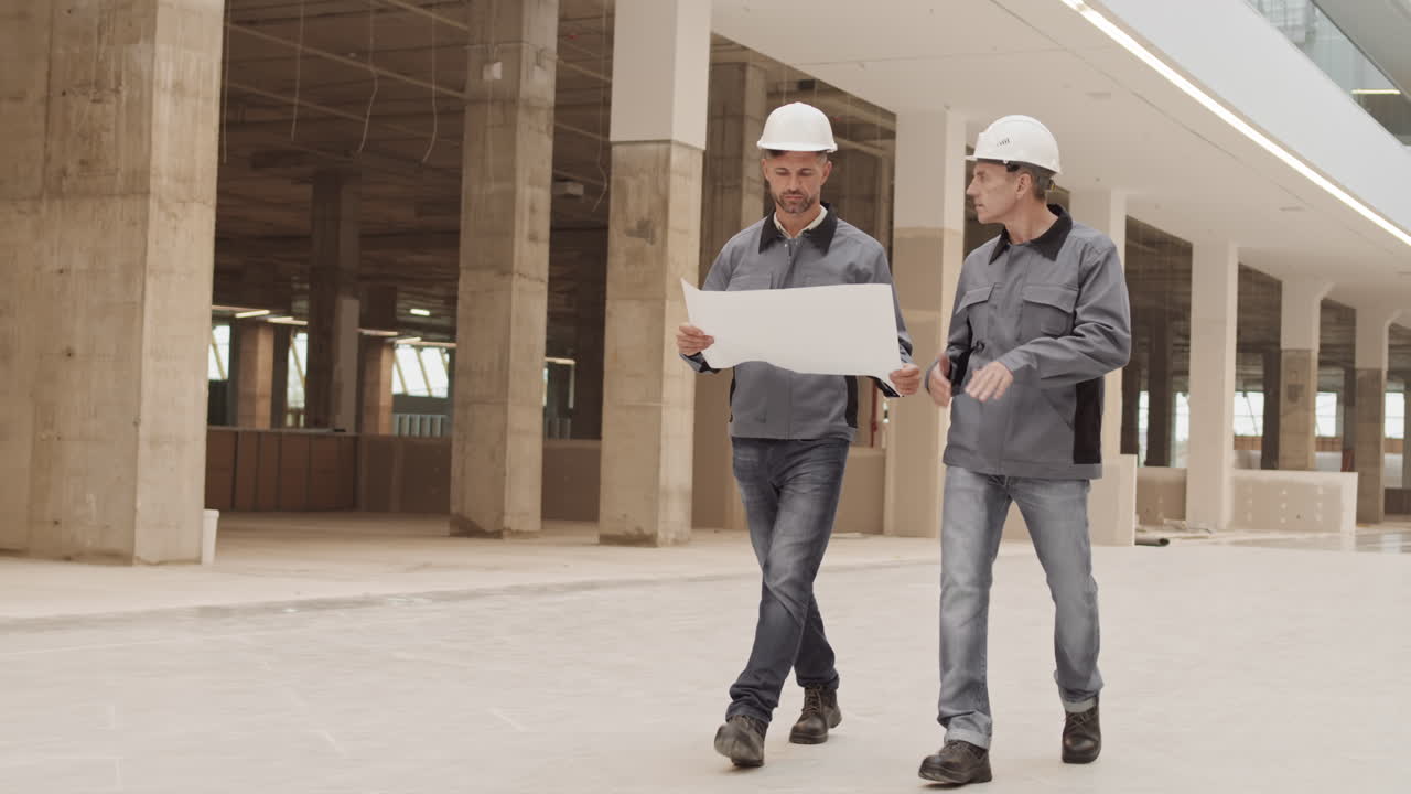 Two Builders Walking at Work