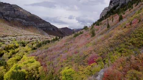 autumn colors aerial flyover provo canyon near bridal veil falls, utah