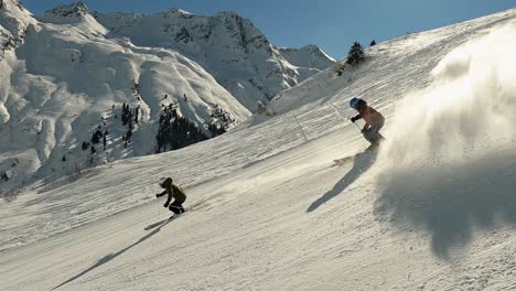 Ski-show-of-two-young-male-skier-in-beautiful-mountain-landscape-with-high-speed