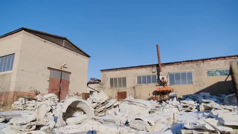 abandoned factory site with demolition debris