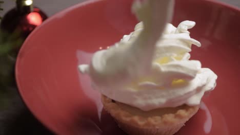 Whipped-cream-topping-over-mince-pie-at-Christmas