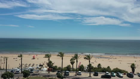 aerial drone view of the carcavelos beach near the city of lisbon, portugal